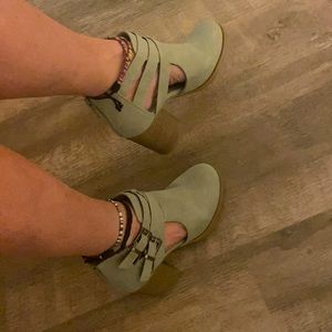 Chunky heeled suede boots with side cut out